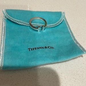 Tiffany& Co. Silver ring…size 71/2. Normal wear and tear-please see pictures.